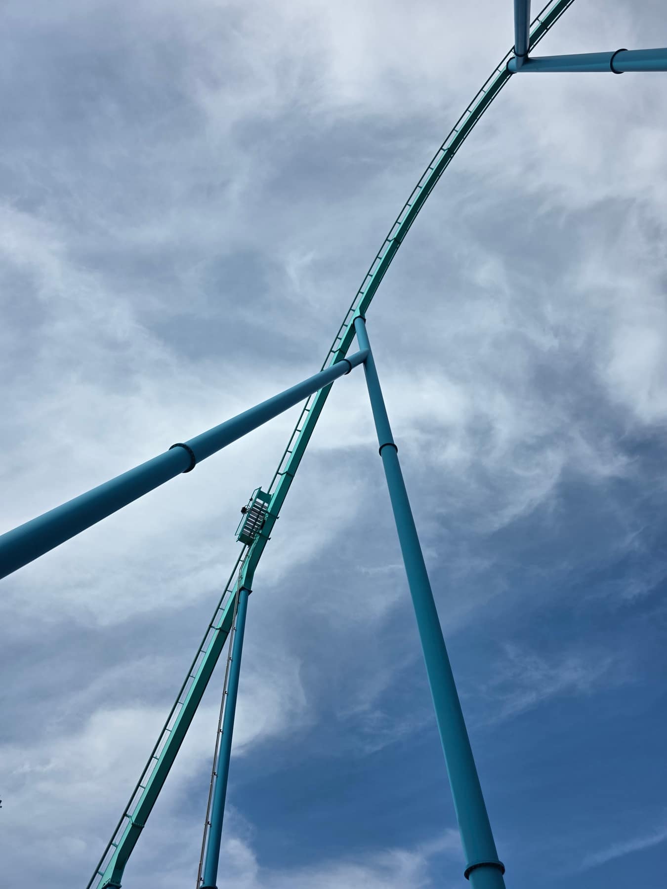Leviathan's teal track crossing itself against a cloudy sky.